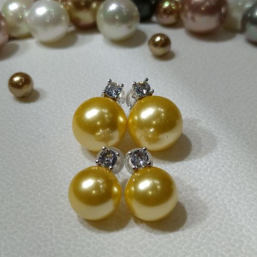 Latofatli ziraklar tilla Shell Pearl va PearlStore fianit bilan YNA045-G1